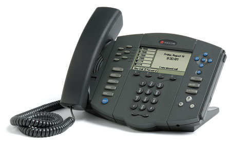 Desktop VoIP phone with dot matrix display screen and various buttons including keypad