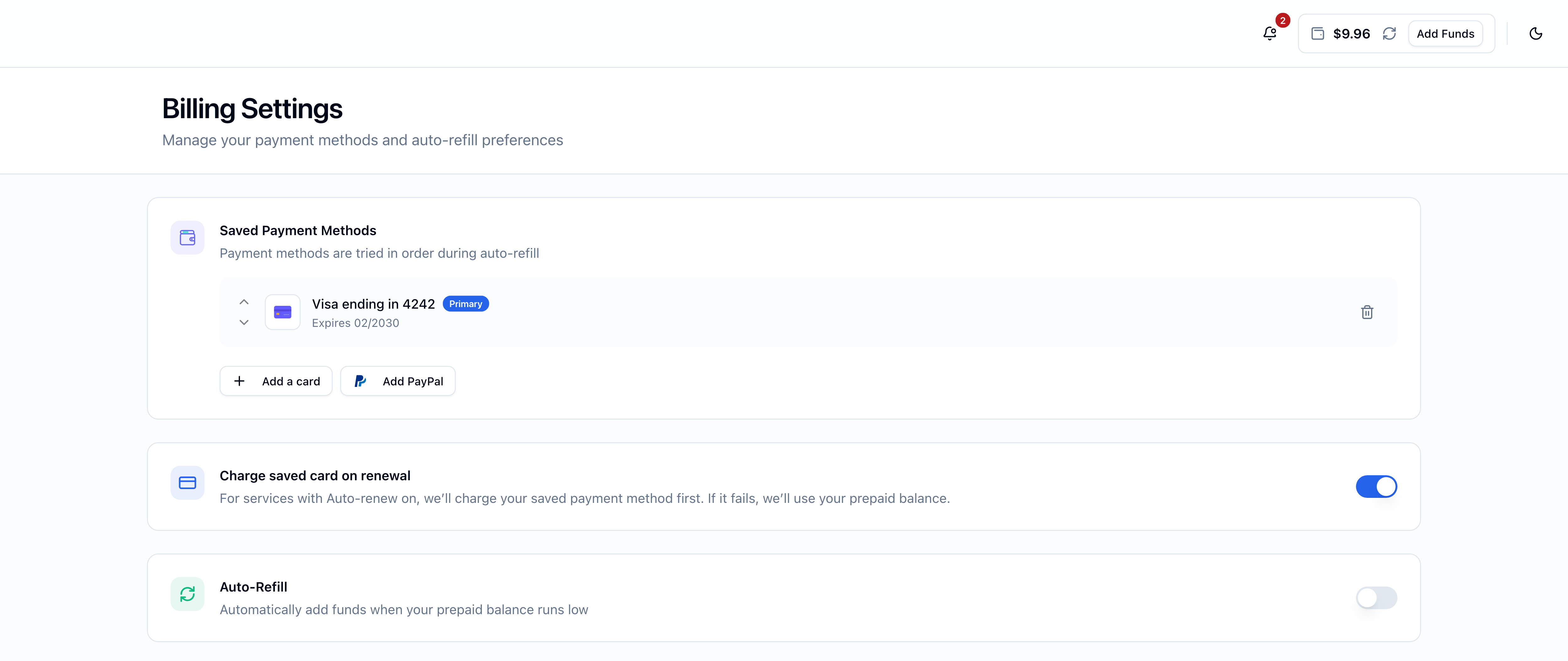 Billing Settings page with three cards stacked: Saved Payment Methods (a Visa ending 4242 marked Primary, with Add a card and Add PayPal buttons), Charge saved card on renewal (toggle on, description 'For services with Auto-renew on, we'll charge your saved payment method first. If it fails, we'll use your prepaid balance.'), and Auto-Refill (toggle off, description 'Automatically add funds when your prepaid balance runs low')