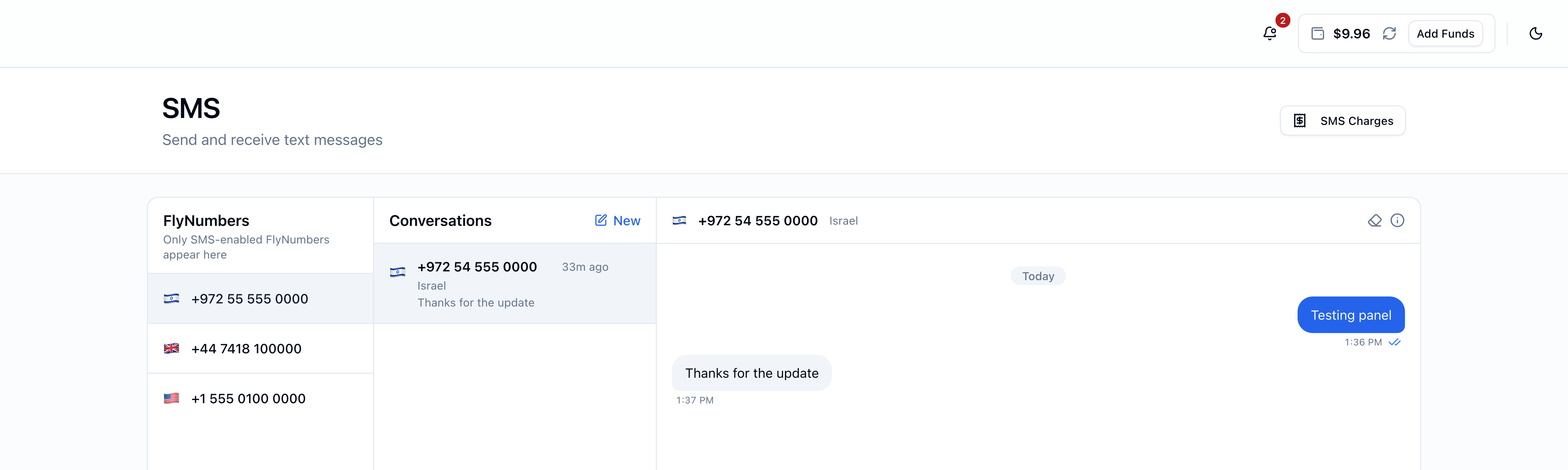 SMS page with three panes: a FlyNumbers list on the left showing three SMS-enabled numbers (with the Israeli one selected), a Conversations middle pane with one conversation row and a New button, and a thread on the right showing the contact's number, a Today separator, an outbound 'Testing panel' message bubble (blue, right-aligned, with double-check delivered icon) and an inbound 'Thanks for the update' message bubble (gray, left-aligned)